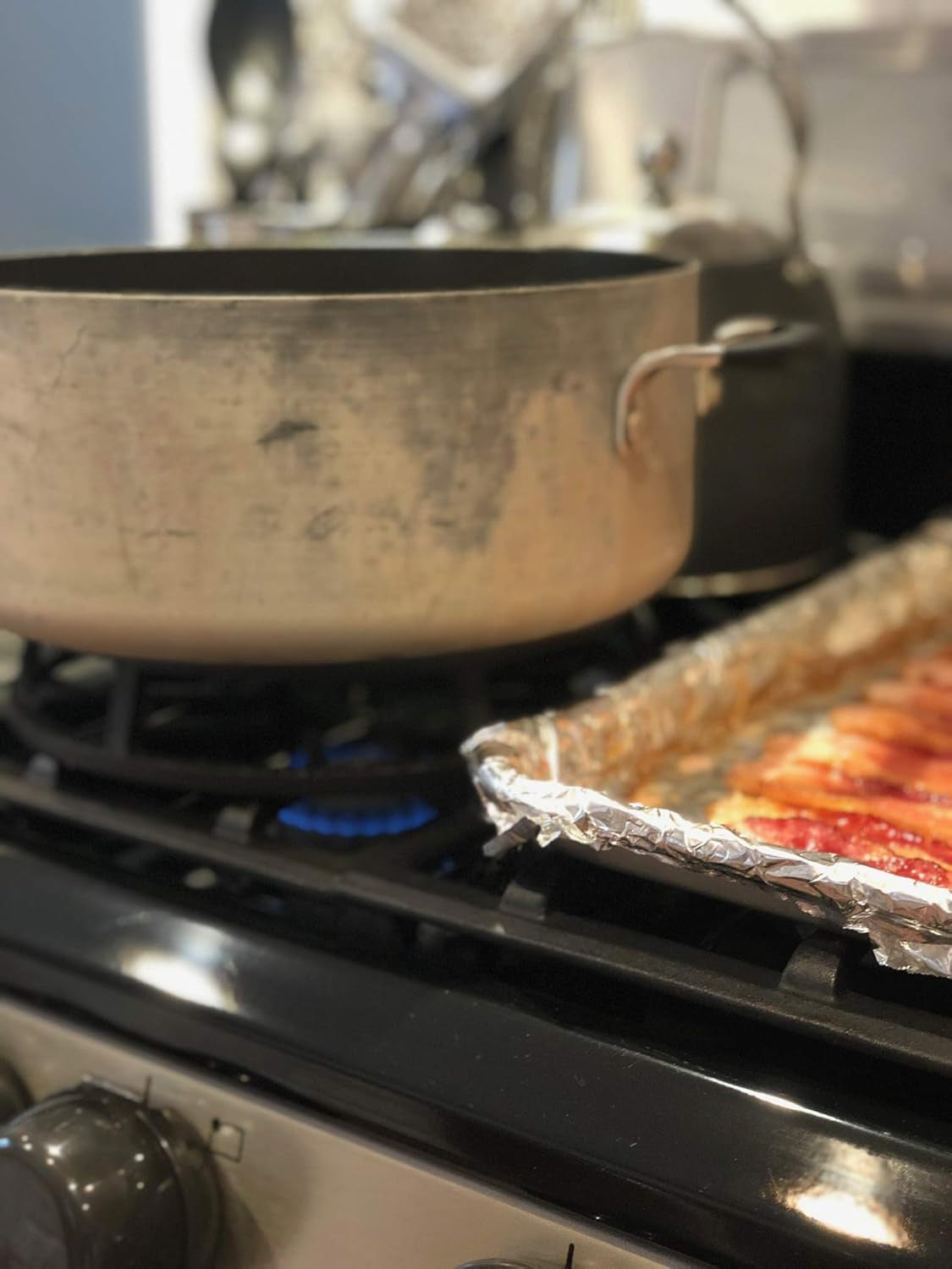 CAST IRON COOKWARE, STOVE TOP HEAT DIFFUSER, TEMPERATURE CONTROL, PARTIAL FLAME GUARD